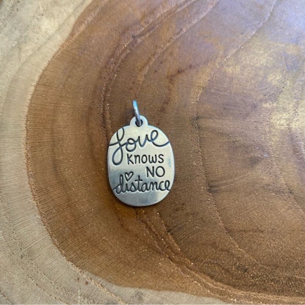 RETIRED James Avery Love Knows No Distance Charm, Sterling Silver